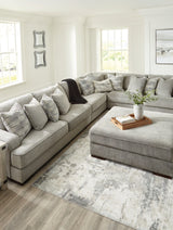 Bayless Smoke 4-Piece Sectional With Ottoman - Ella Furniture