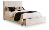 Brizmore Beige Queen Upholstered Storage Bed — angled view