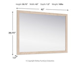Cadmori Tan Bedroom Mirror - Ella Furniture