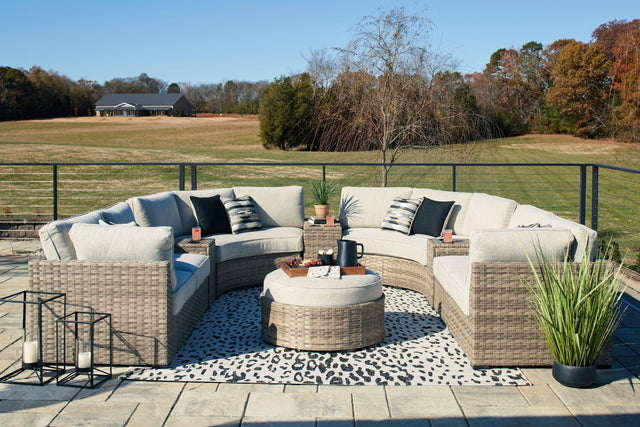 Calworth Beige Outdoor 9-Piece Sectional With Ottoman - Ella Furniture