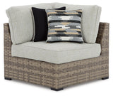 Calworth Beige Outdoor 9-Piece Sectional With Ottoman - Ella Furniture