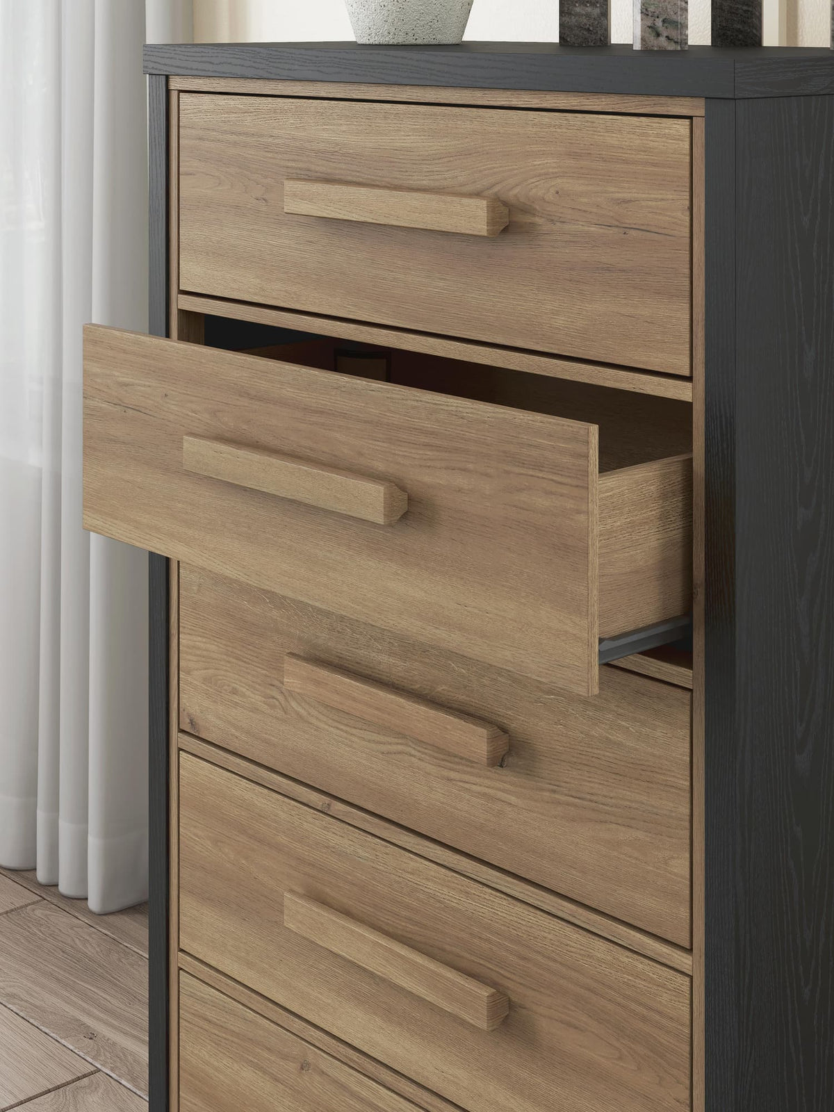 Kozmour Black/Brown Chest of Drawers — detail view