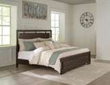 Covetown Dark Brown Panel Bedroom Set King 3: Bed, Dresser, Mirror from Ella Furniture