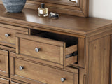 Feddinger Medium Brown Panel Bedroom Set King 3: Bed, Dresser, Mirror from Ella Furniture