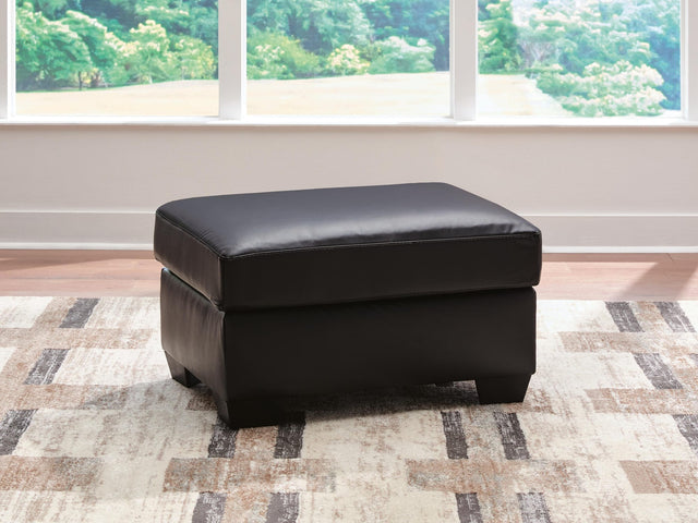 Glennbre Midnight Faux Leather Ottoman from Ella Furniture