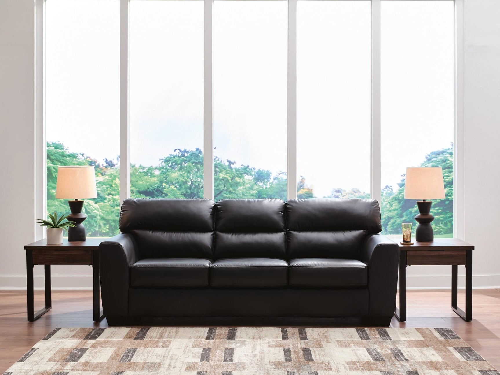 Glennbre Midnight Faux Leather Sofa from Ella Furniture