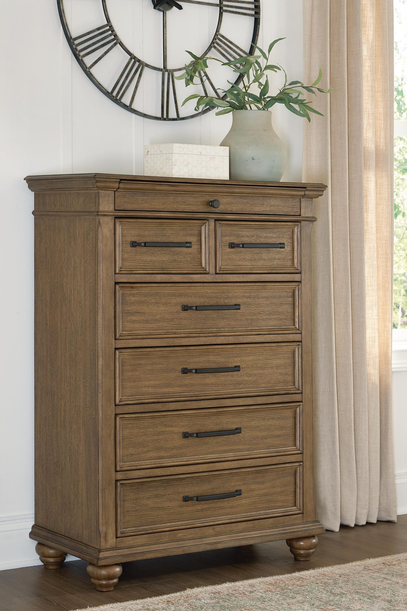 Karallin Medium Brown Chest of Drawers from Ella Furniture
