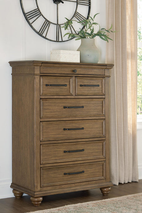 Karallin Medium Brown Chest of Drawers from Ella Furniture