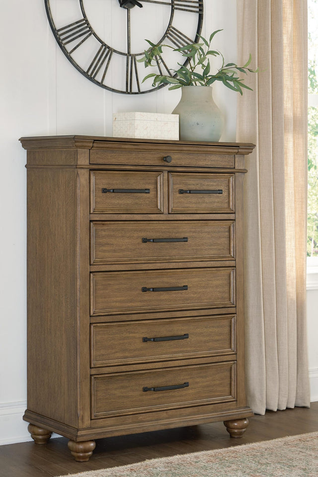 Karallin Medium Brown Chest of Drawers from Ella Furniture