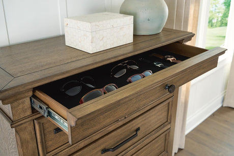 Karallin Medium Brown Chest of Drawers detail view