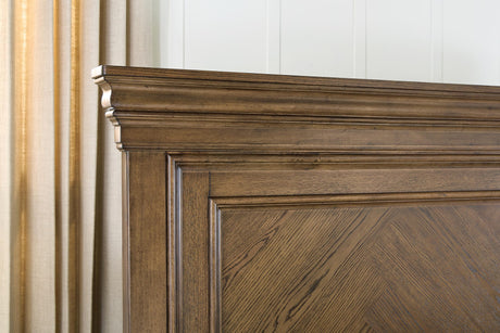 Karallin Medium Brown King Panel Storage Bed detail view