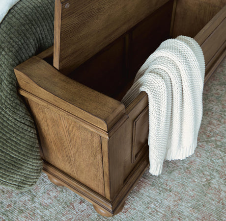 Karallin Medium Brown King Panel Storage Bed detail view