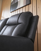 Mackmenville Carbon Faux Leather Reclining Sofa detail view