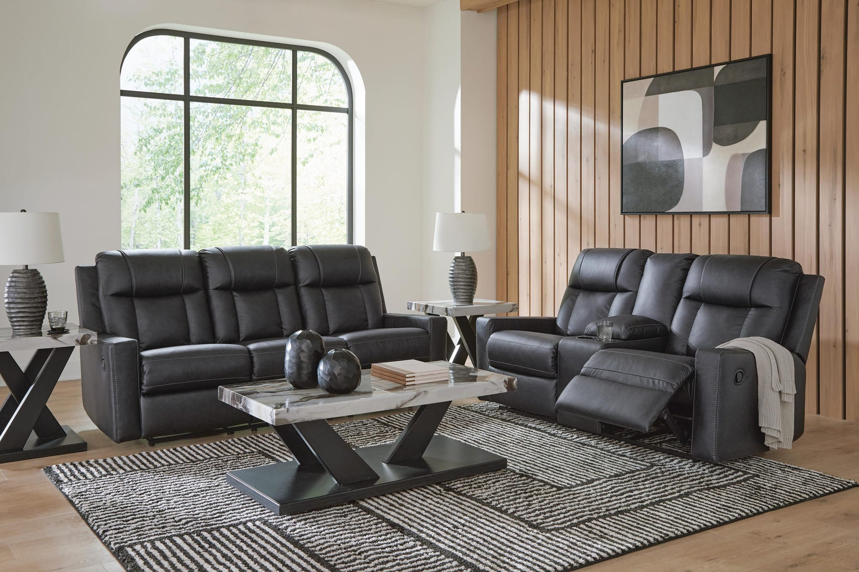 Mackmenville Carbon Reclining Sofa and Reclining Loveseat with Console from Ella Furniture