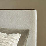 Radkin Burnished Brown King Upholstered Panel Bed detail view