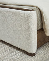 Radkin Burnished Brown King Upholstered Panel Bed detail view