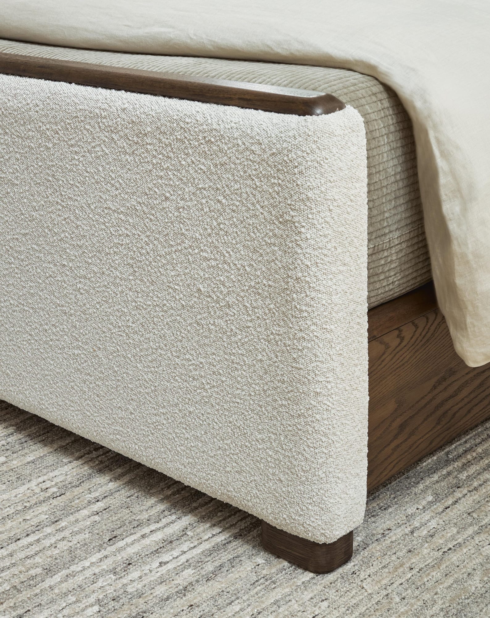 Radkin Burnished Brown King Upholstered Panel Bed detail view