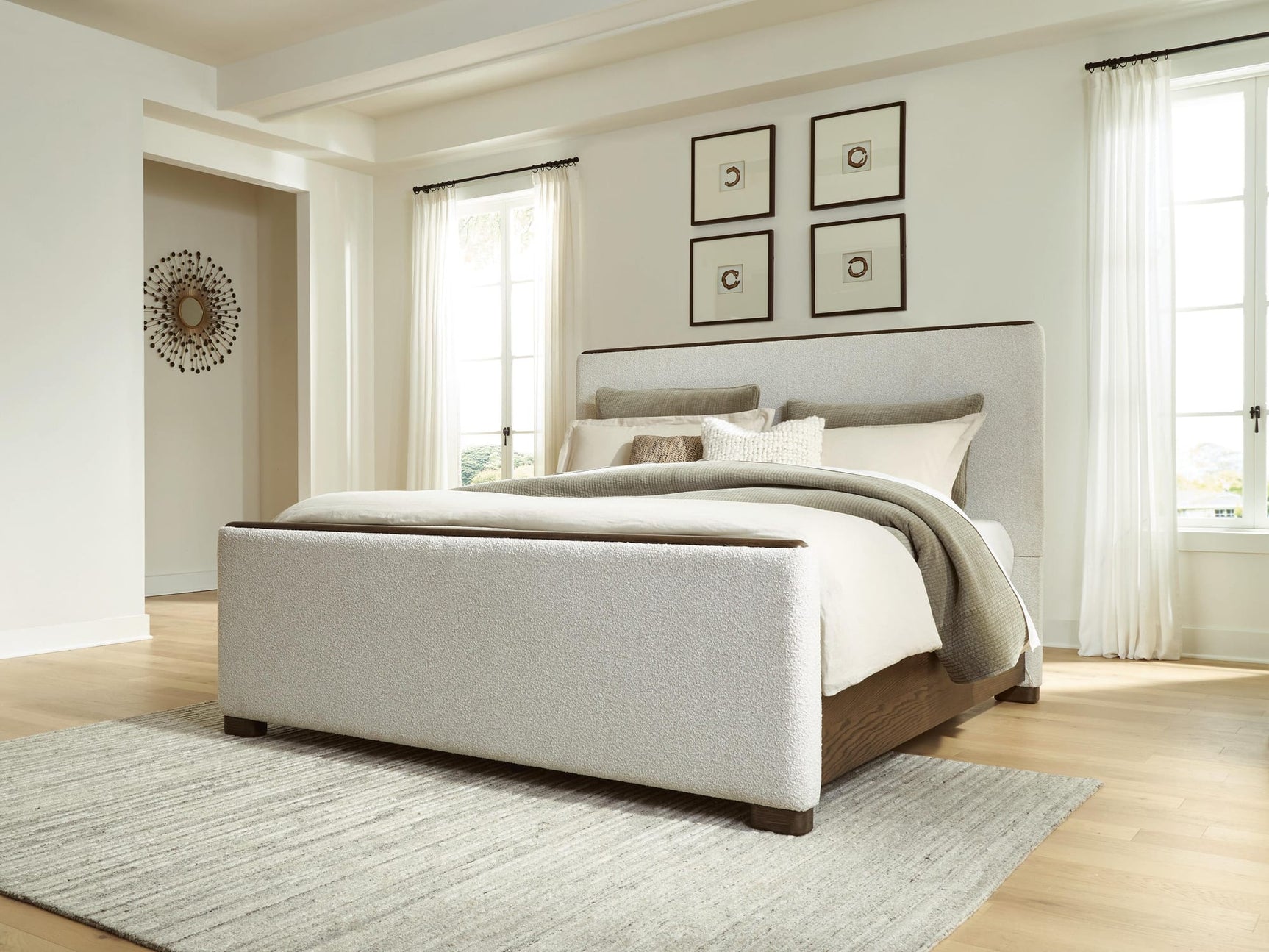 Radkin Burnished Brown Queen Upholstered Panel Bed from Ella Furniture
