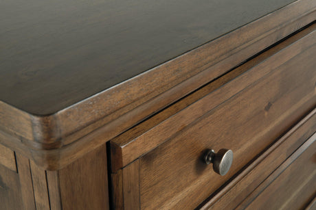 Flynnter Medium Brown Panel Bedroom Set - Ella Furniture