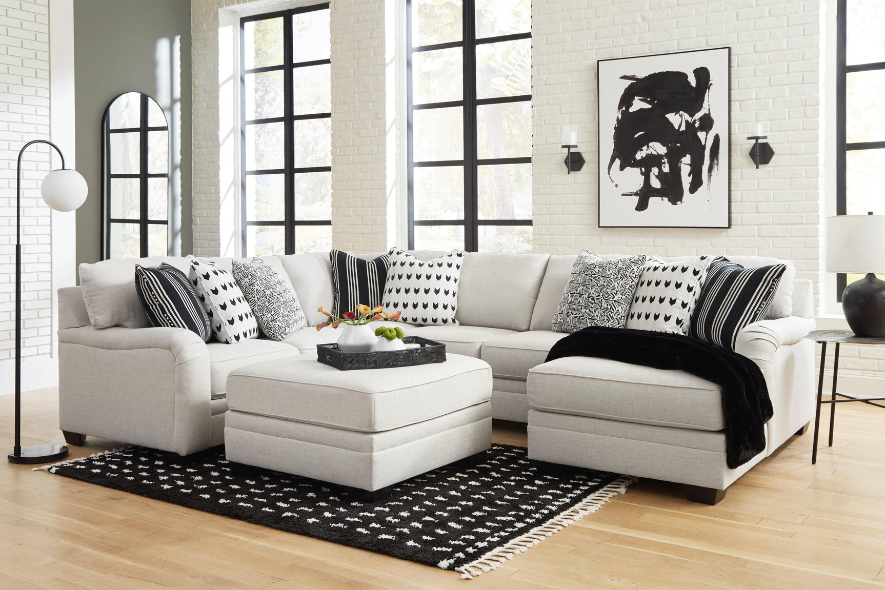 Huntsworth Dove Gray 4-Piece Sectional With Ottoman - Ella Furniture