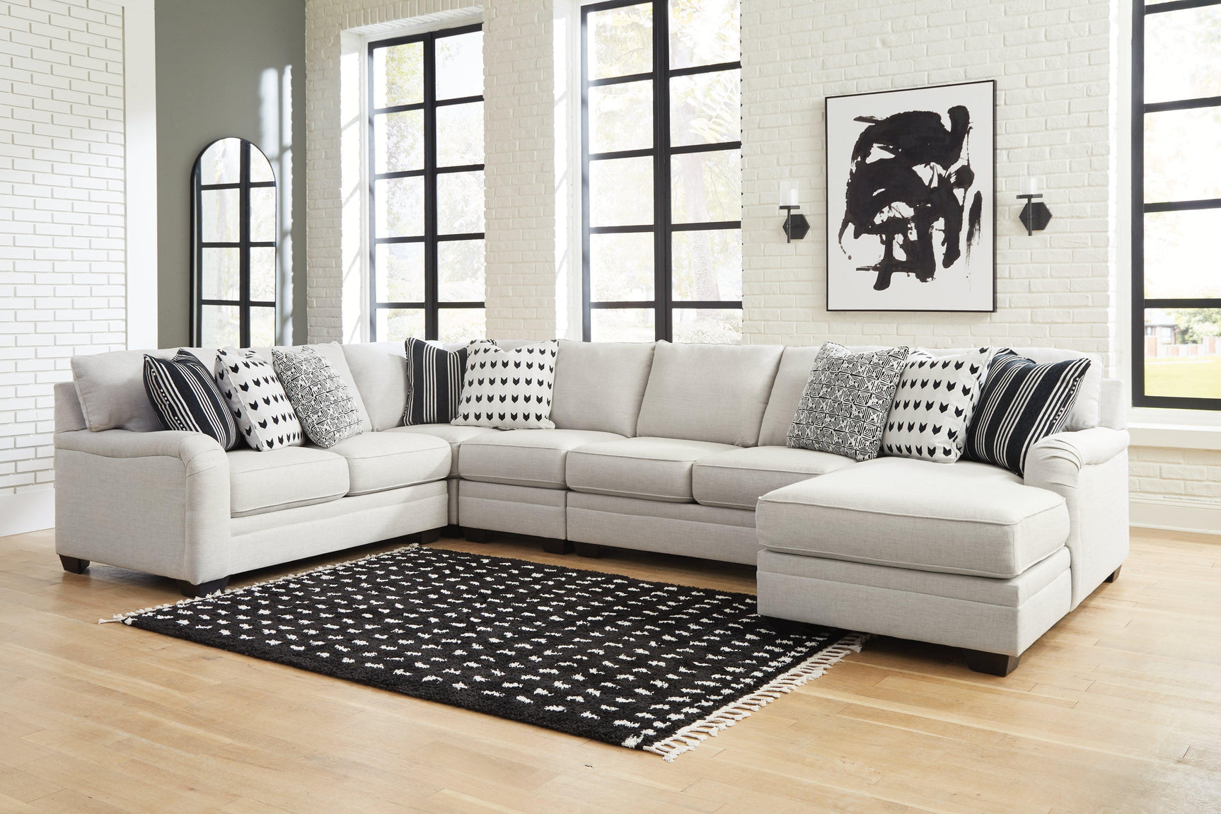 Huntsworth Dove Gray 5-Piece Sectional With Ottoman - Ella Furniture