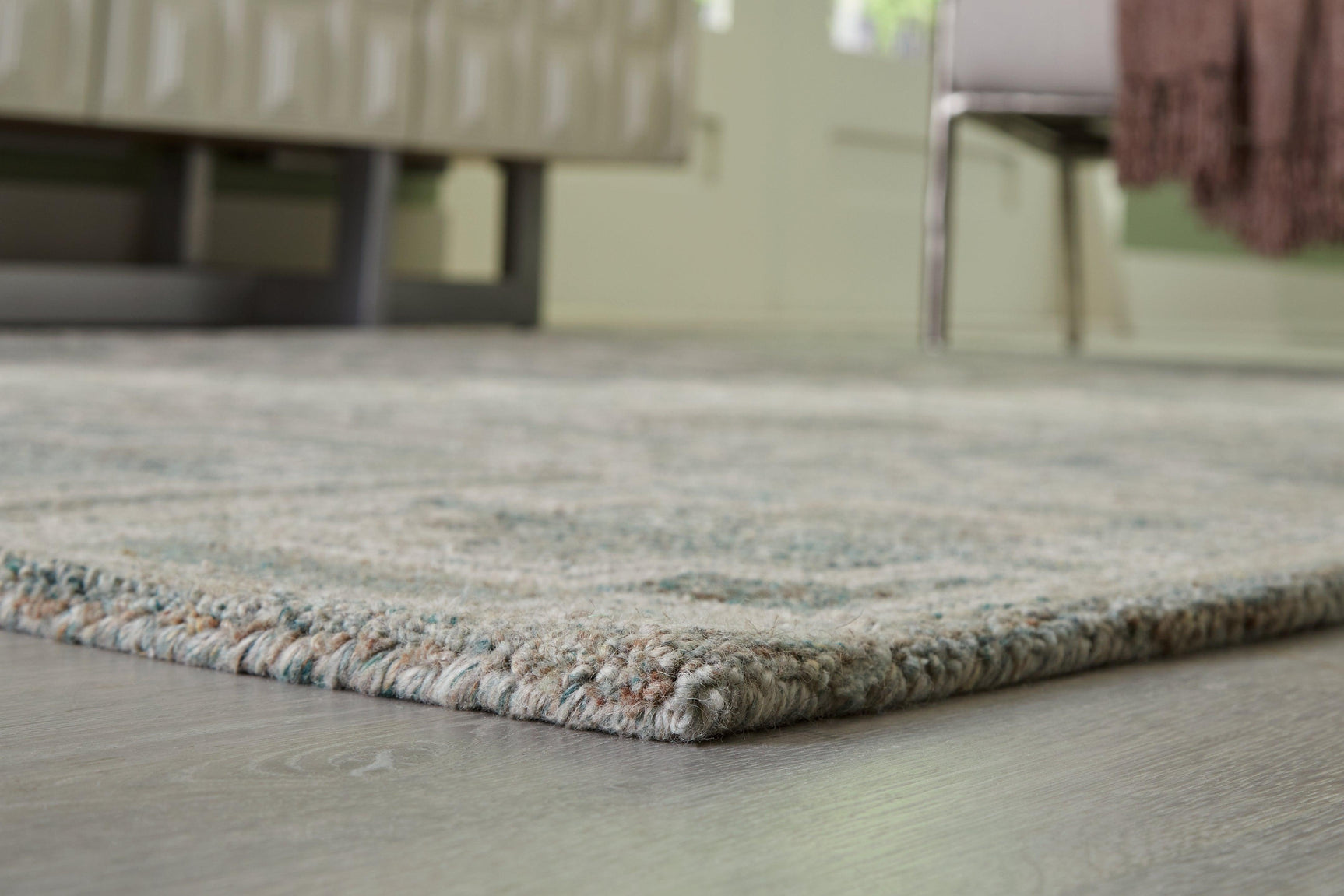 Jossland Green/Ivory Medium Rug - Ella Furniture