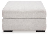 Koralynn Stone 3-Piece Sectional With Ottoman - Ella Furniture