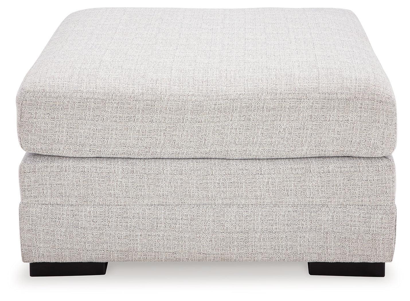 Koralynn Stone 3-Piece Sectional With Ottoman - Ella Furniture
