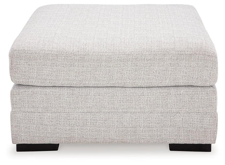 Koralynn Stone 3-Piece Sectional With Ottoman - Ella Furniture
