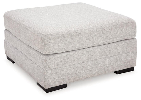 Koralynn Stone 3-Piece Sectional With Ottoman - Ella Furniture