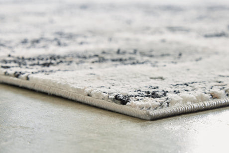 Langwell Black/Gray/White Large Rug - Ella Furniture