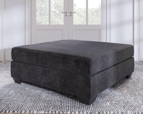 Lavernett Charcoal 4-Piece Sectional With Ottoman - Ella Furniture