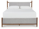 Lyncott Brown King Upholstered Bed - Ella Furniture