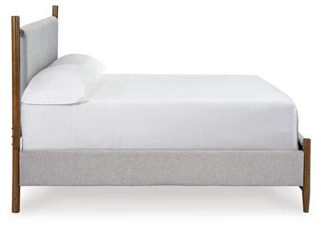 Lyncott Brown Queen Upholstered Panel Bed - Ella Furniture
