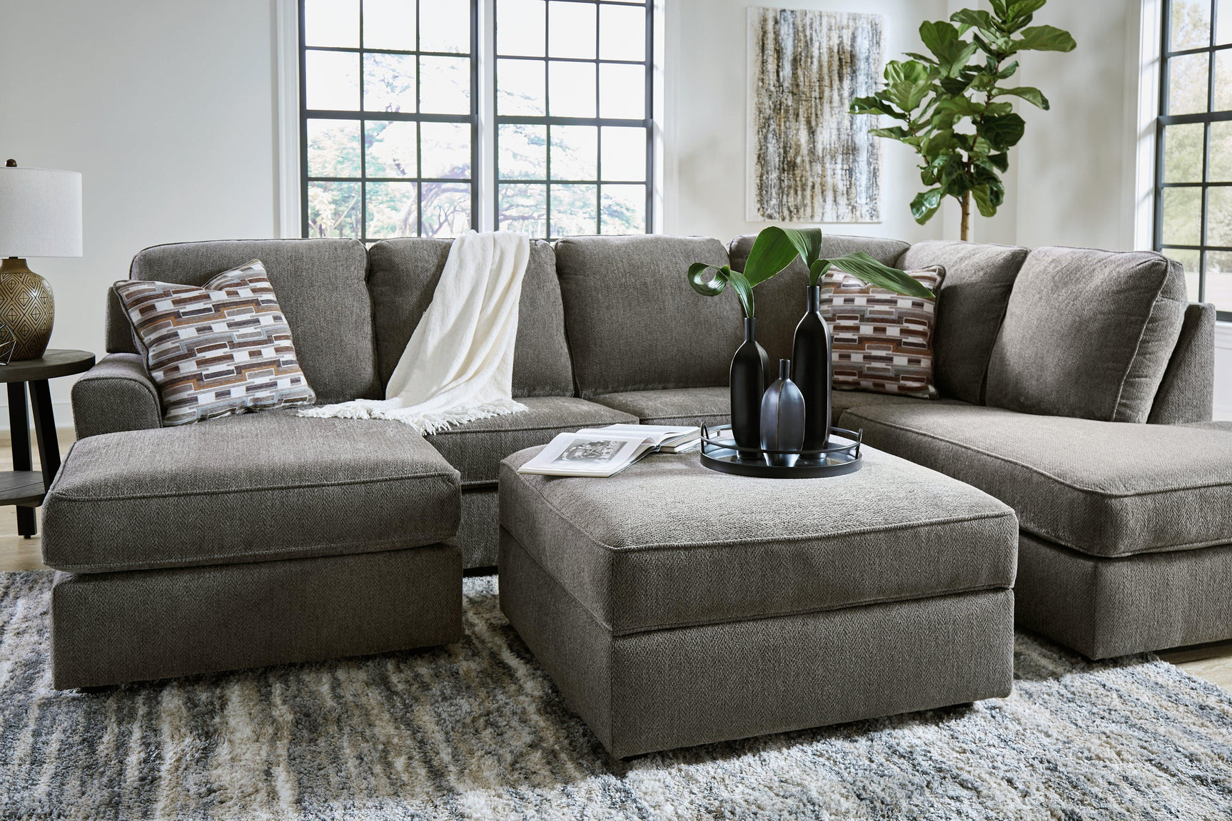 O'phannon Putty 2-Piece Sectional With Ottoman - Ella Furniture