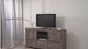 Coralee Gray TV Stand