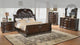 Stanley Cherry Brown Faux Leather Upholstered Tufted Sleigh King Bed