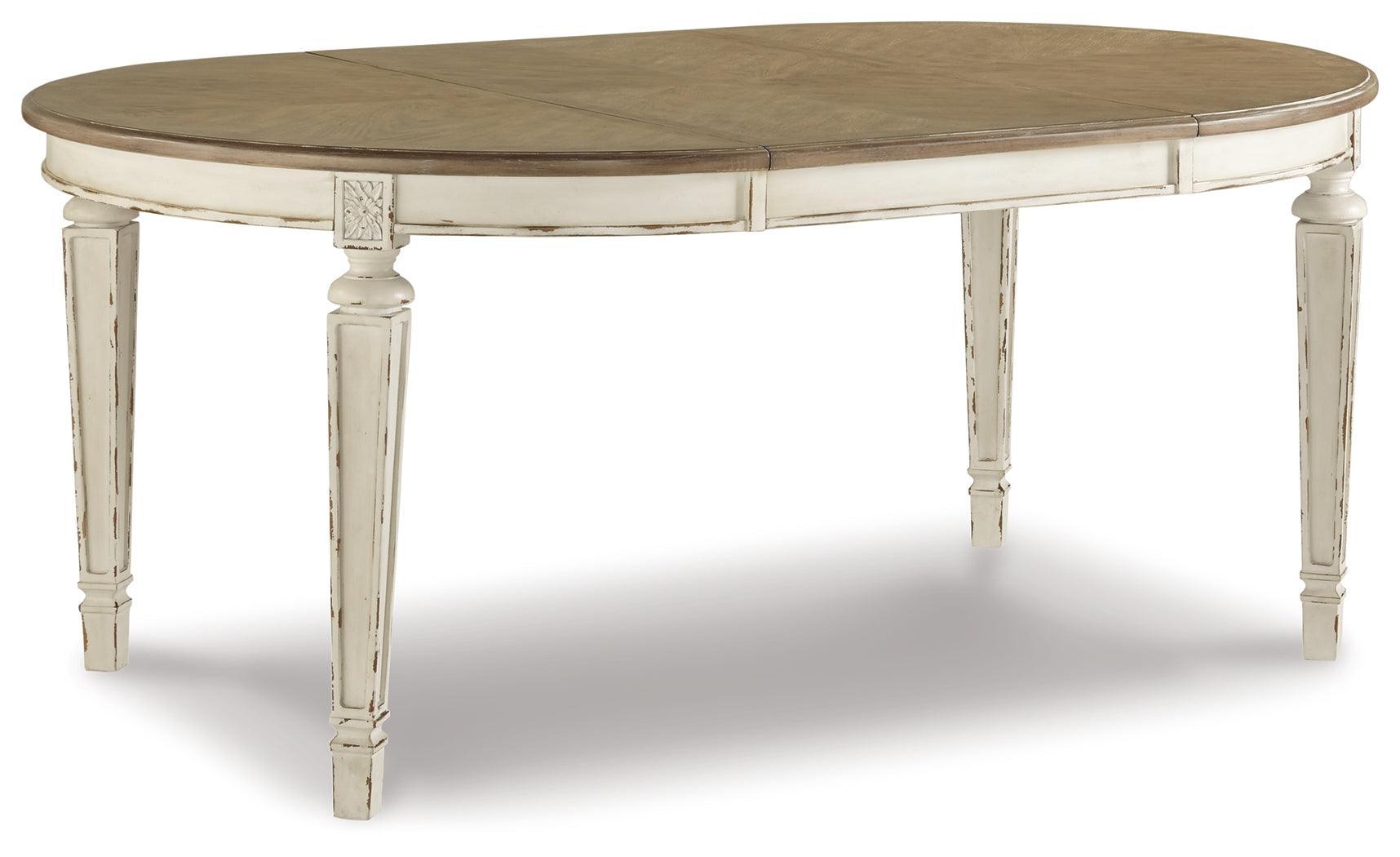 Realyn Chipped White Oval Dining Room Set - Ella Furniture