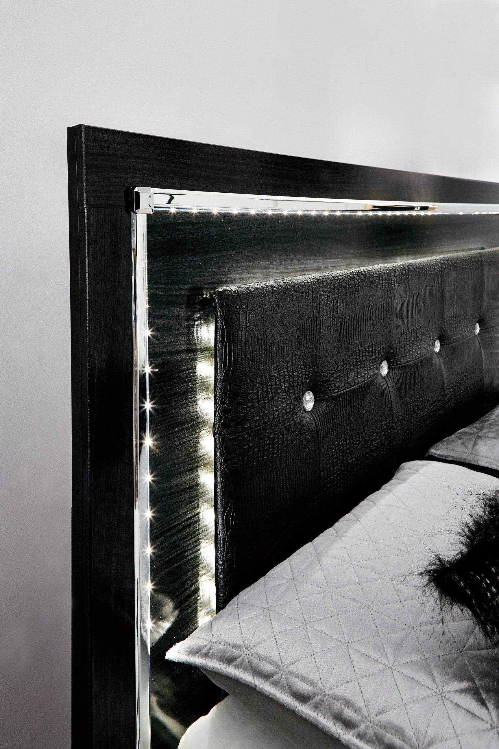 Kaydell Black Upholstered Storage Panel Bedroom Set