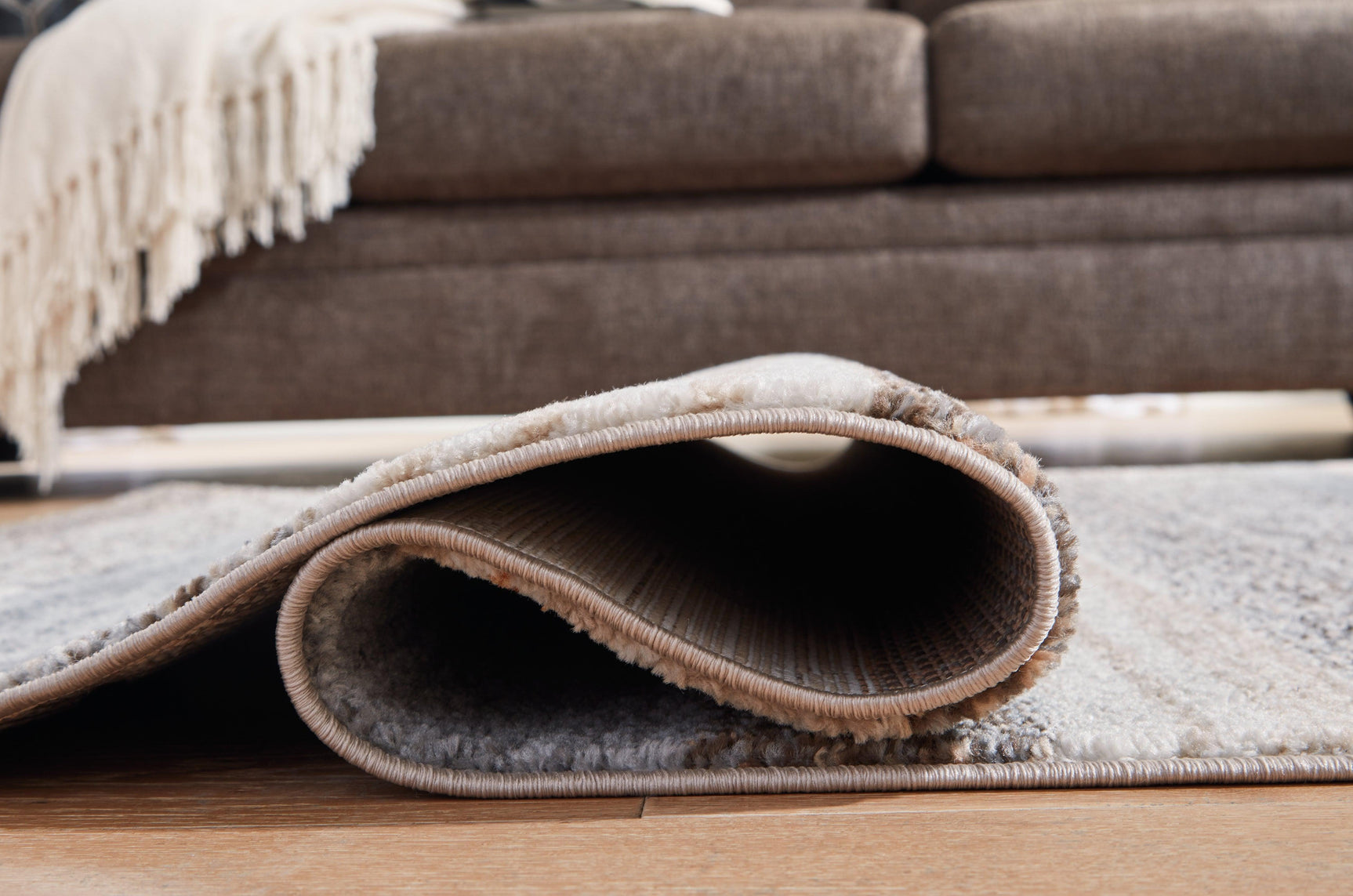 Sethburn Cream/brown/gray Large Rug - Ella Furniture