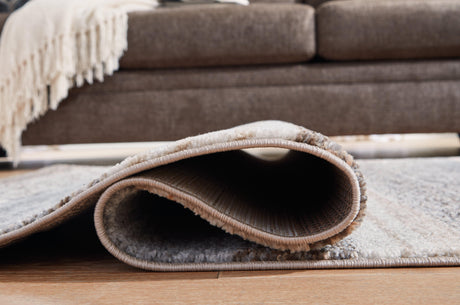 Sethburn Cream/brown/gray Medium Rug - Ella Furniture