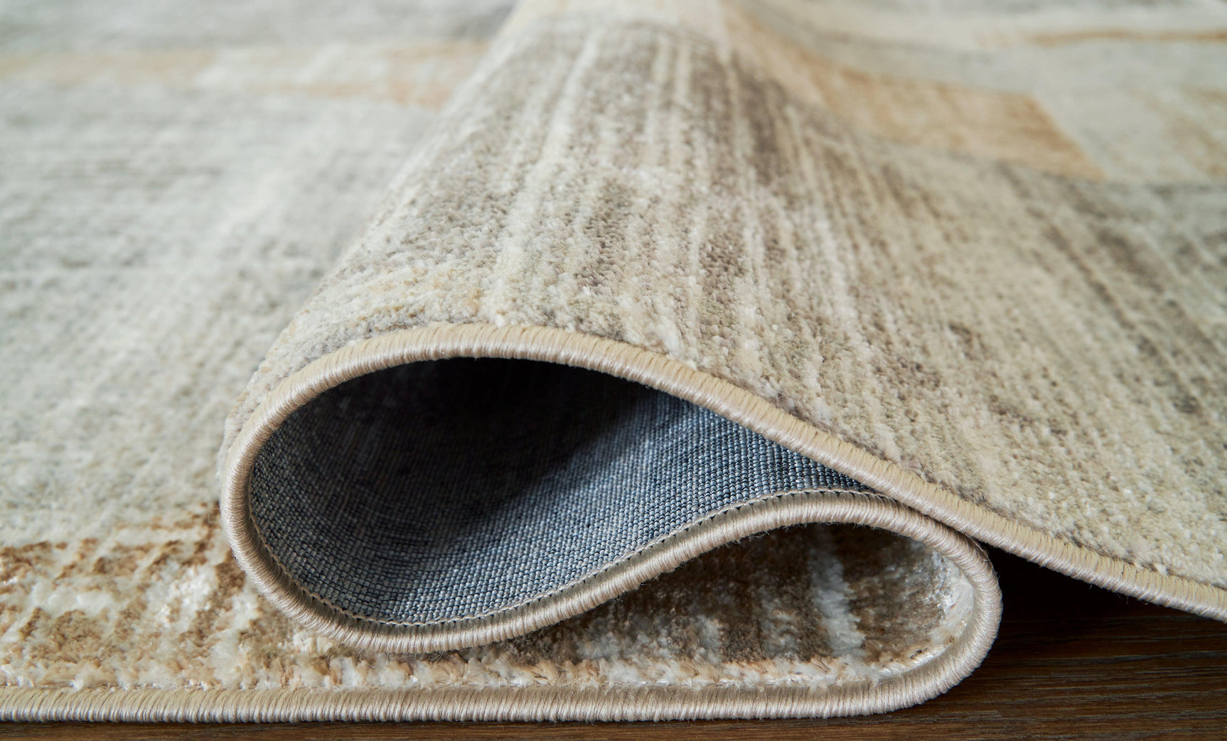 Truward Linen/Gray/Caramel Medium Rug - Ella Furniture