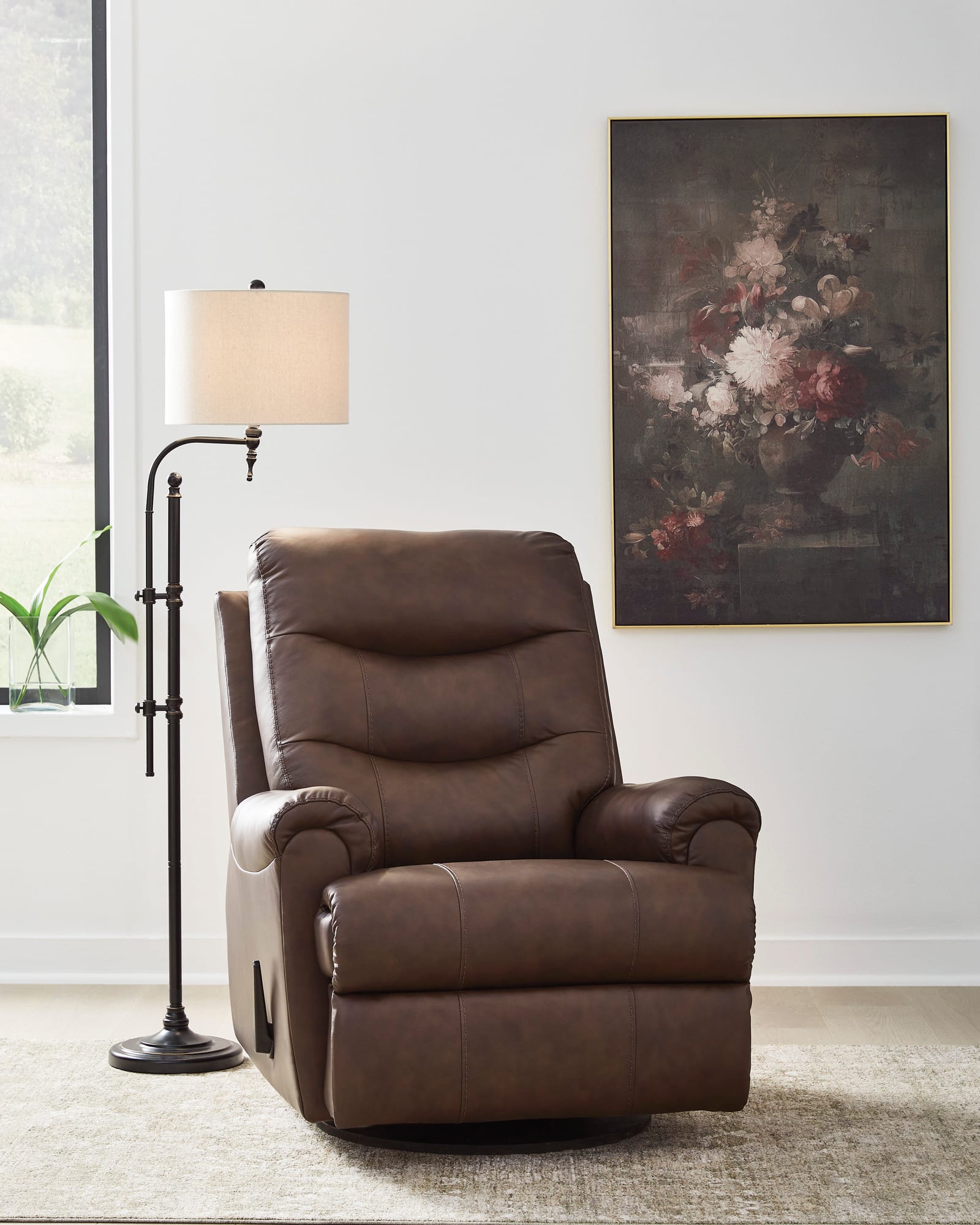 Ulsa Dark Brown Top Grain Leather Swivel Recliner from Ella Furniture