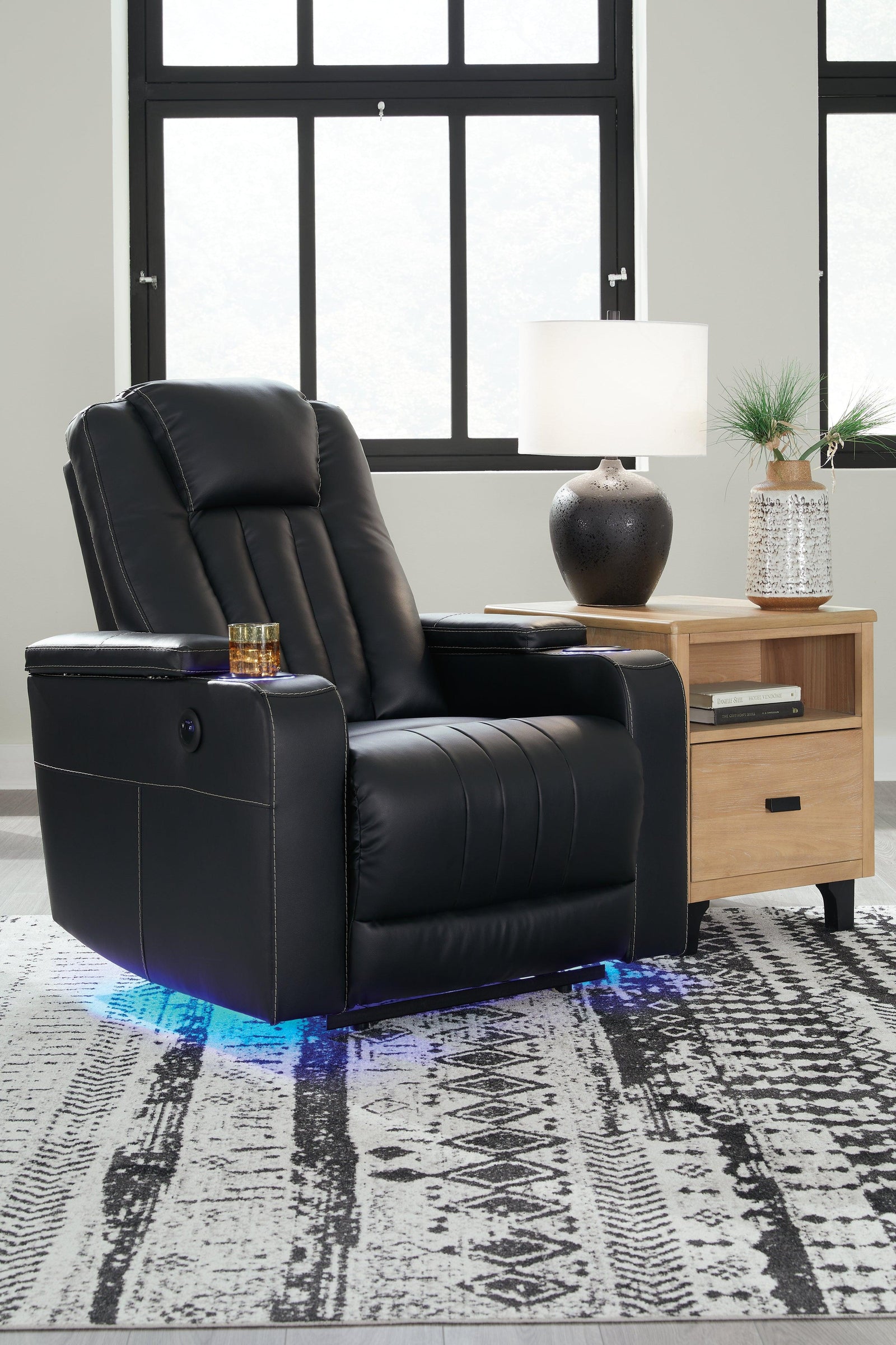 Center Point Black Faux Leather Recliner - Ella Furniture