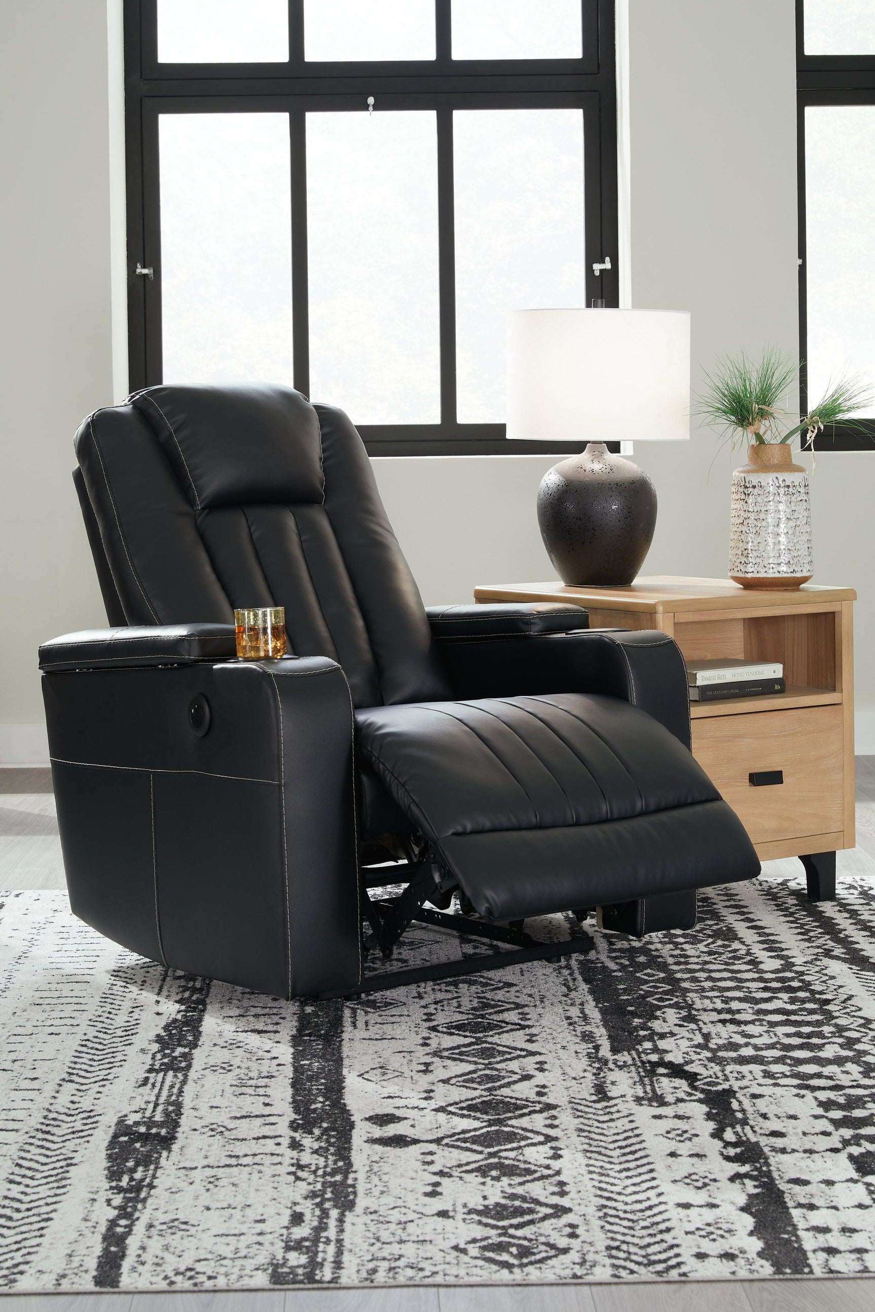 Center Point Black Faux Leather Recliner - Ella Furniture