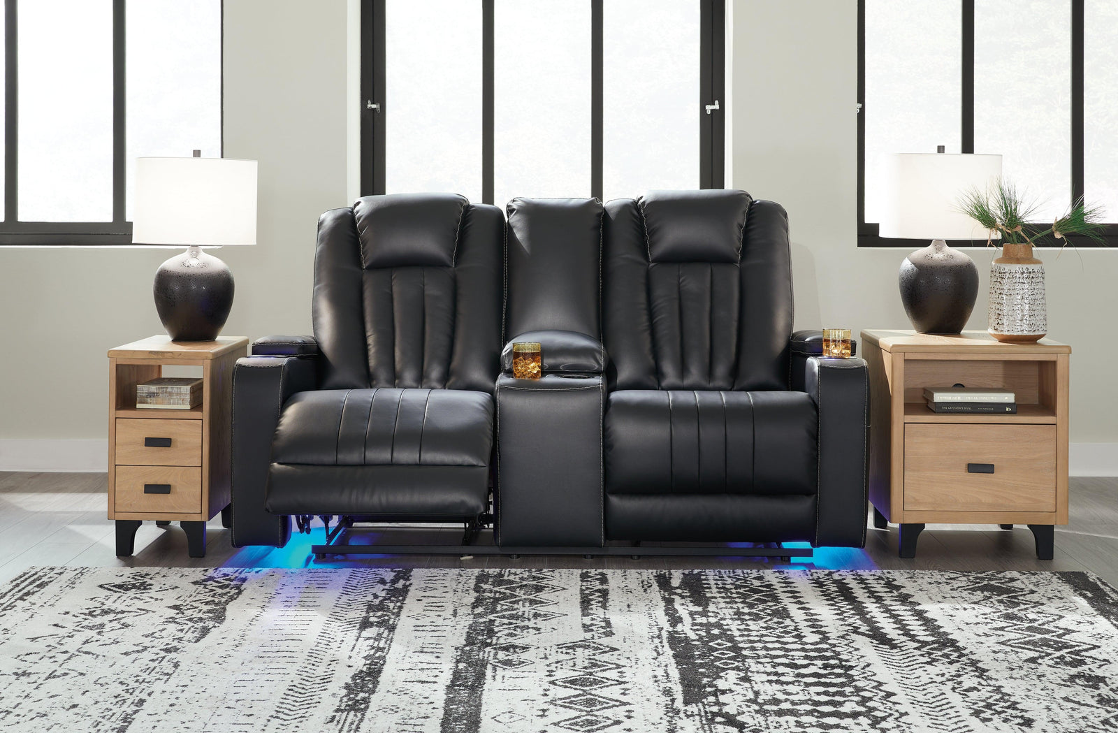 Center Point Black Faux Leather Reclining Loveseat With Console - Ella Furniture