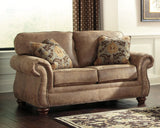 Larkinhurst Earth Faux Leather Loveseat - Ella Furniture