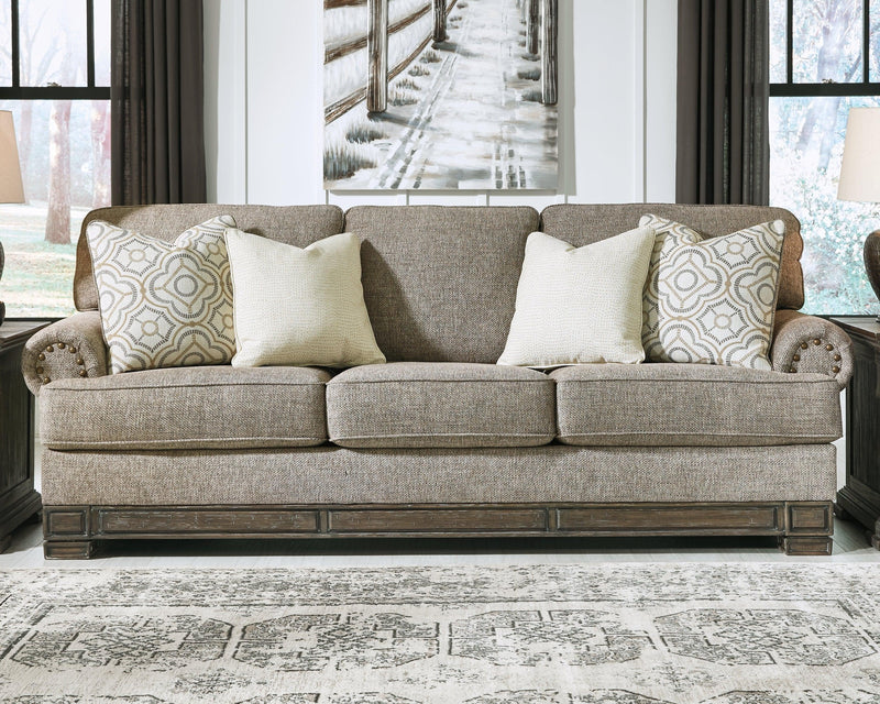 Einsgrove Sandstone Sofa, Loveseat, Chair And Ottoman