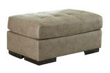 Maderla Pebble Faux Leather Ottoman - Ella Furniture