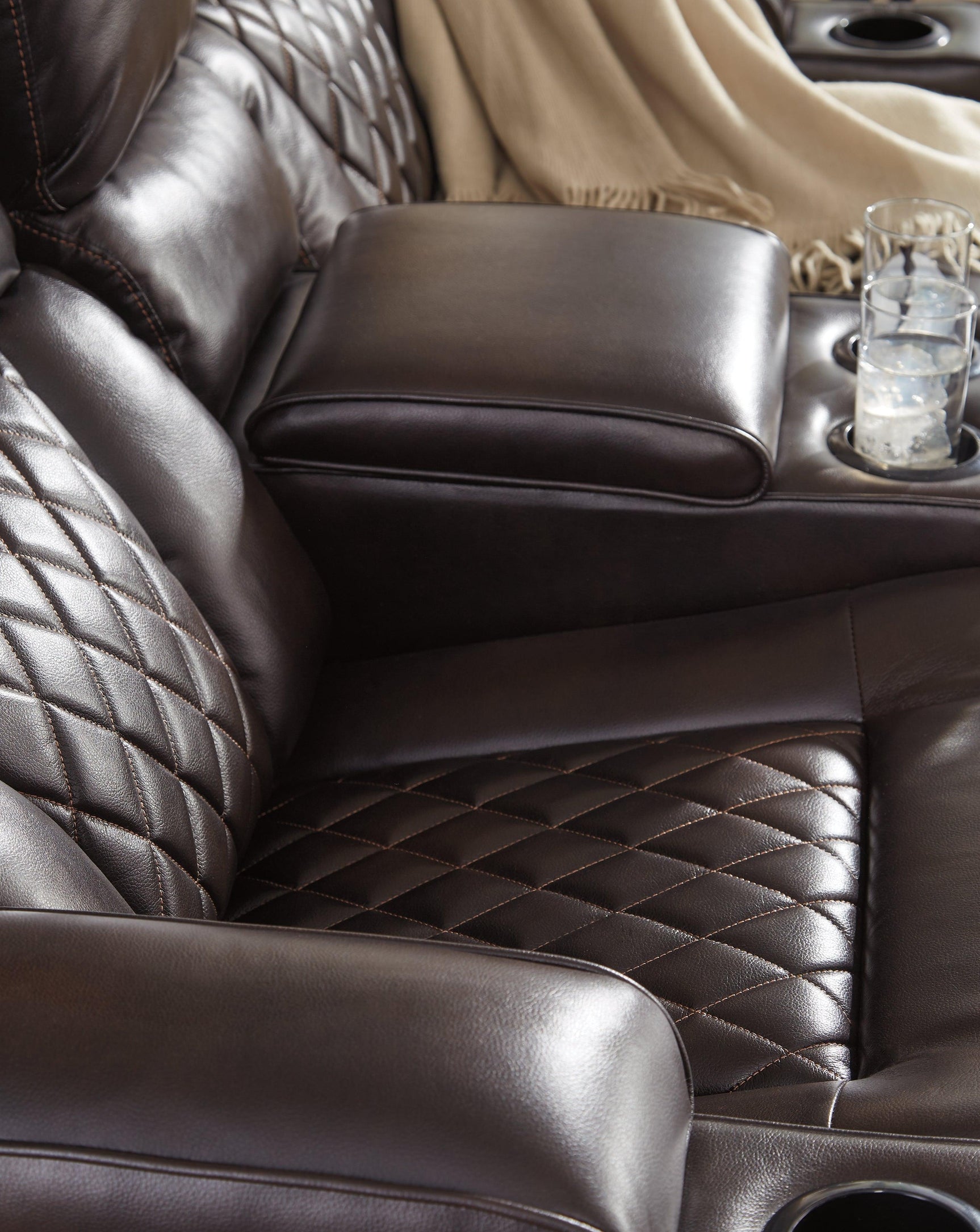 Warnerton Chocolate Faux Leather Power Reclining Sofa - Ella Furniture